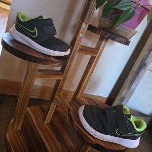 Nike Kids Black Sneakers with Green Accents